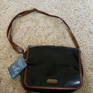 Black w/ brown Bible or book cover, zips on 3 sides, w/shoulder strap.